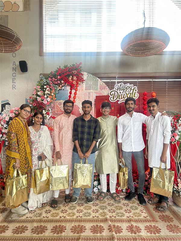 people holding umbrellas on a busy street at night lit by street lights and illuminated signs in Tokyo, Japan